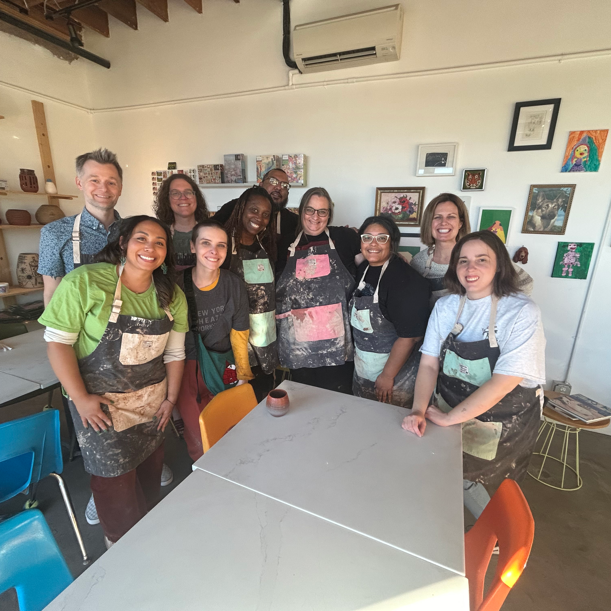 EJUSA staff in a pottery class