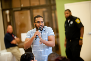 Photo of Lionel Latouche leading a Trauma to Trust training.
